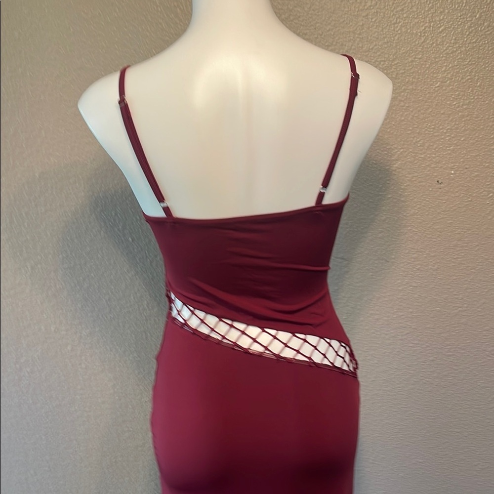 Elegant Asymmetrical Burgundy Dress with Chic Open Areas - Picture 4 of 9